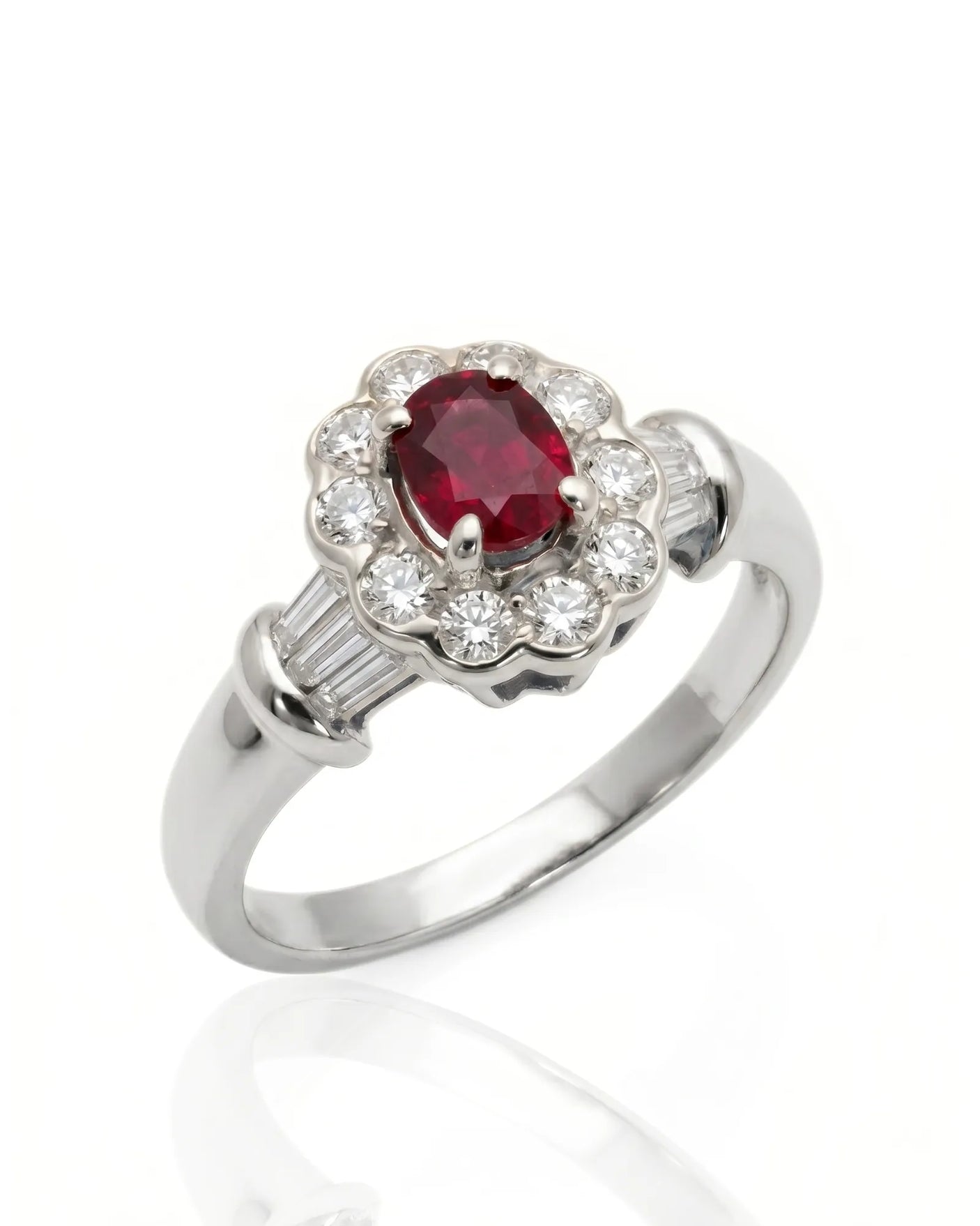 Oval ruby ring with diamond halo and baguette accents in polished platinum | SARATTI