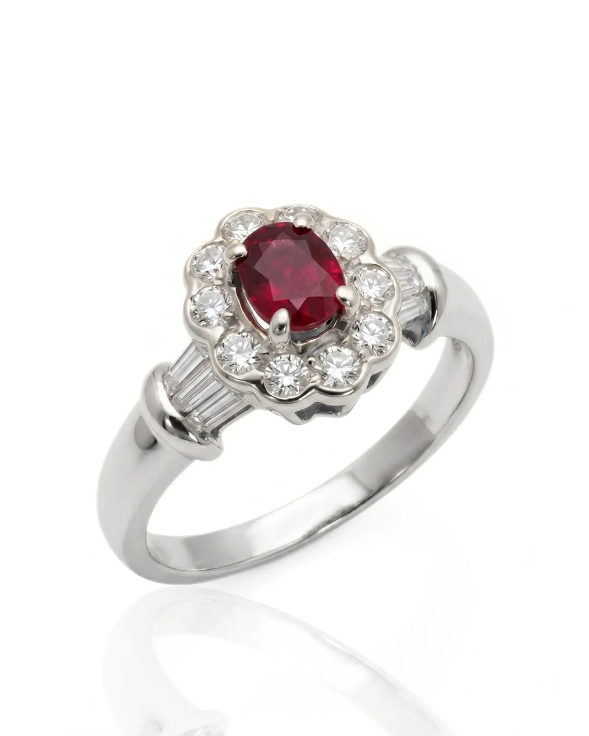 Oval ruby ring with diamond halo and baguette accents in polished platinum | SARATTI