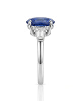 Oval sapphire and diamond engagement ring in platinum for meaningful gifting | SARATTI