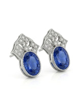Oval sapphire diamond stud earrings with geometric floral detailing in 18K white gold | SARATTI