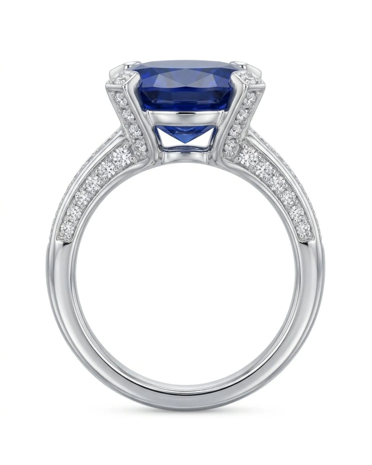 Oval sapphire pavé diamond ring with tapered shoulder detailing and platinum craftsmanship | SARATTI