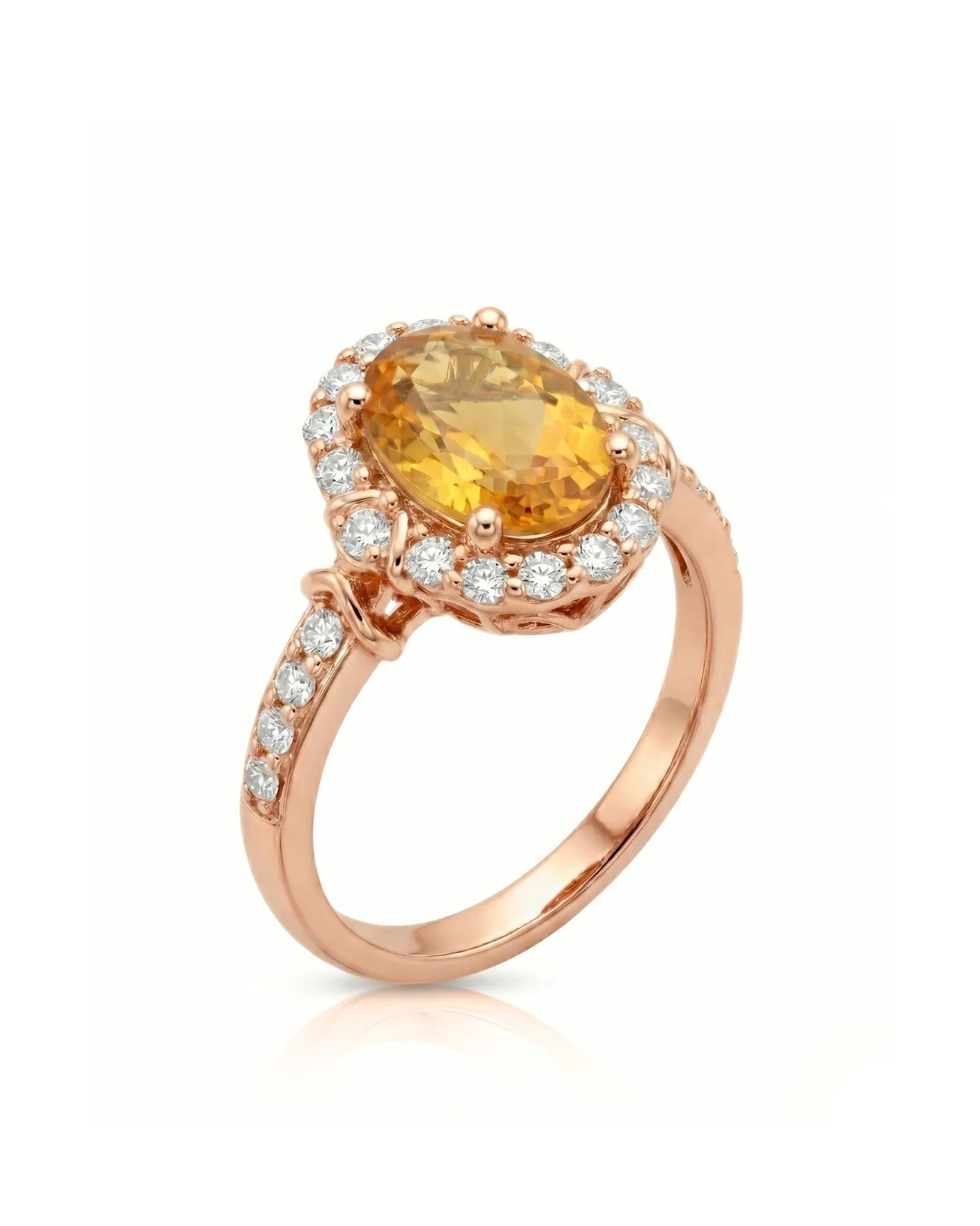 Oval yellow sapphire ring with diamond halo and shoulder accents in 18K rose gold | SARATTI