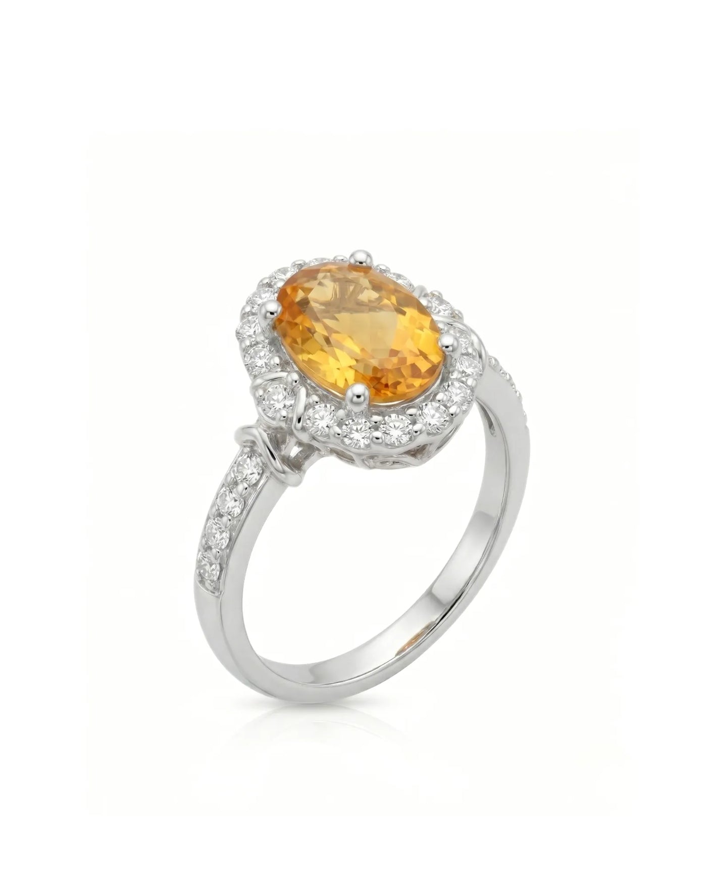 Oval yellow sapphire ring with diamond halo and shoulder accents in 18K white gold | SARATTI