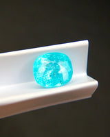 Paraiba-Type Tourmaline cushion with rounded corners and faceted surface | SARATT