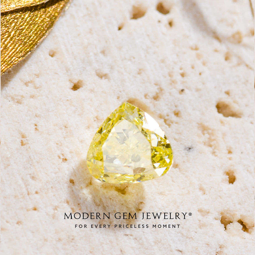 Fancy Yellow Natural Diamond Loose Gemstone in a Pear Shape | Modern Gem Jewelry