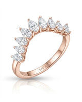 Pear-shaped diamond wedding band with brilliant gemstones arranged across a curved 18K rose gold setting | SARATTI