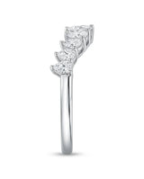 Pear-shaped diamond wedding band with brilliant gemstones arranged across an elegant curved platinum setting | SARATTI