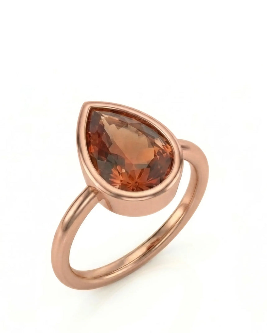 Pear cut Natural Imperial Topaz bezel setting in 18K rose gold | SARATTI