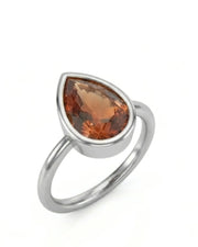 Pear cut Natural Imperial Topaz bezel setting in platinum | SARATTI