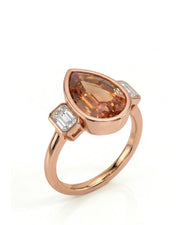 Pear cut Natural Imperial Topaz three-stone bezel setting in 18K rose gold | SARATTI