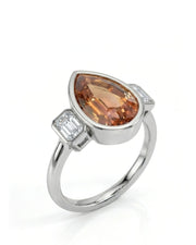 Pear cut Natural Imperial Topaz three-stone bezel setting in 18K white gold | SARATTI