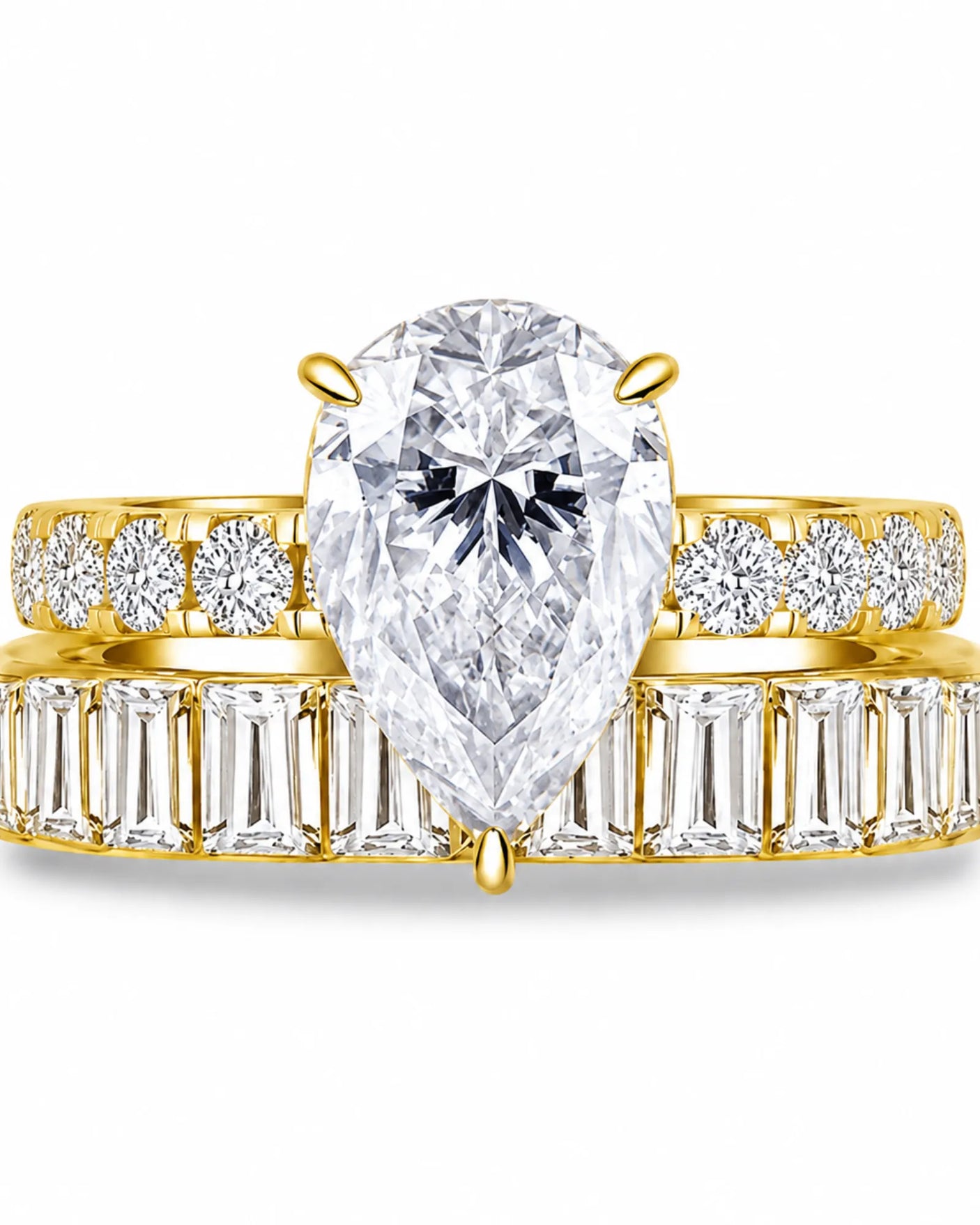 Pear cut moissanite ring in yellow gold with brilliant shoulder accents and elegant profile | SARATTI.