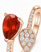Pear cut natural ruby ring with diamonds in 18K Rose Gold | SARATTI