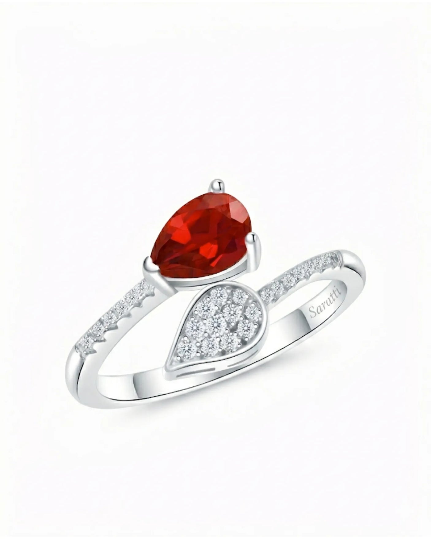 Pear cut natural ruby ring with diamonds in Platinum | SARATTI
