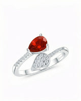 Pear cut natural ruby ring with diamonds in Platinum | SARATTI