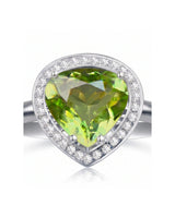 Pear green tourmaline engagement ring with sparkling diamonds in 18K White Gold | SARATTI