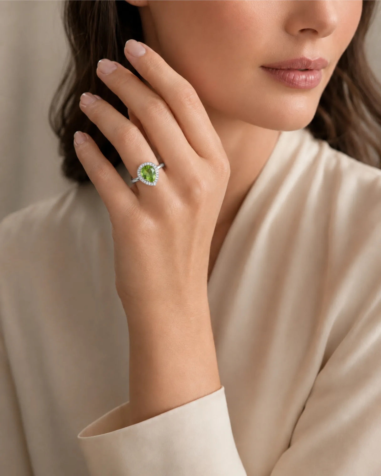 Pear green tourmaline engagement ring with sparkling diamonds in timeless Platinum | SARATTI