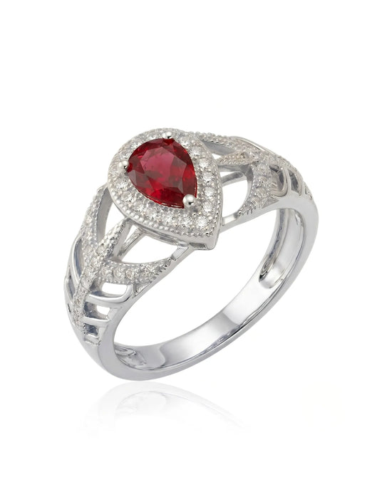 Pear ruby ring with diamond halo and split shank in 18K white gold | SARATTI