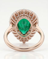 Pear shaped emerald halo ring in 18K rose gold | SARATTI
