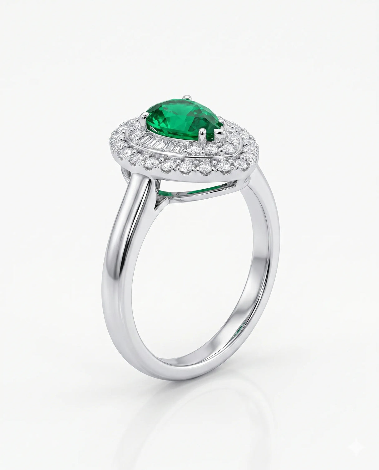 Pear shaped emerald halo ring in platinum | SARATTI

