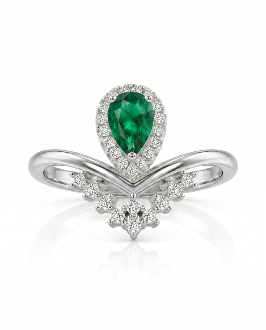 Pear shaped emerald promise ring in platinum | SARATTI
