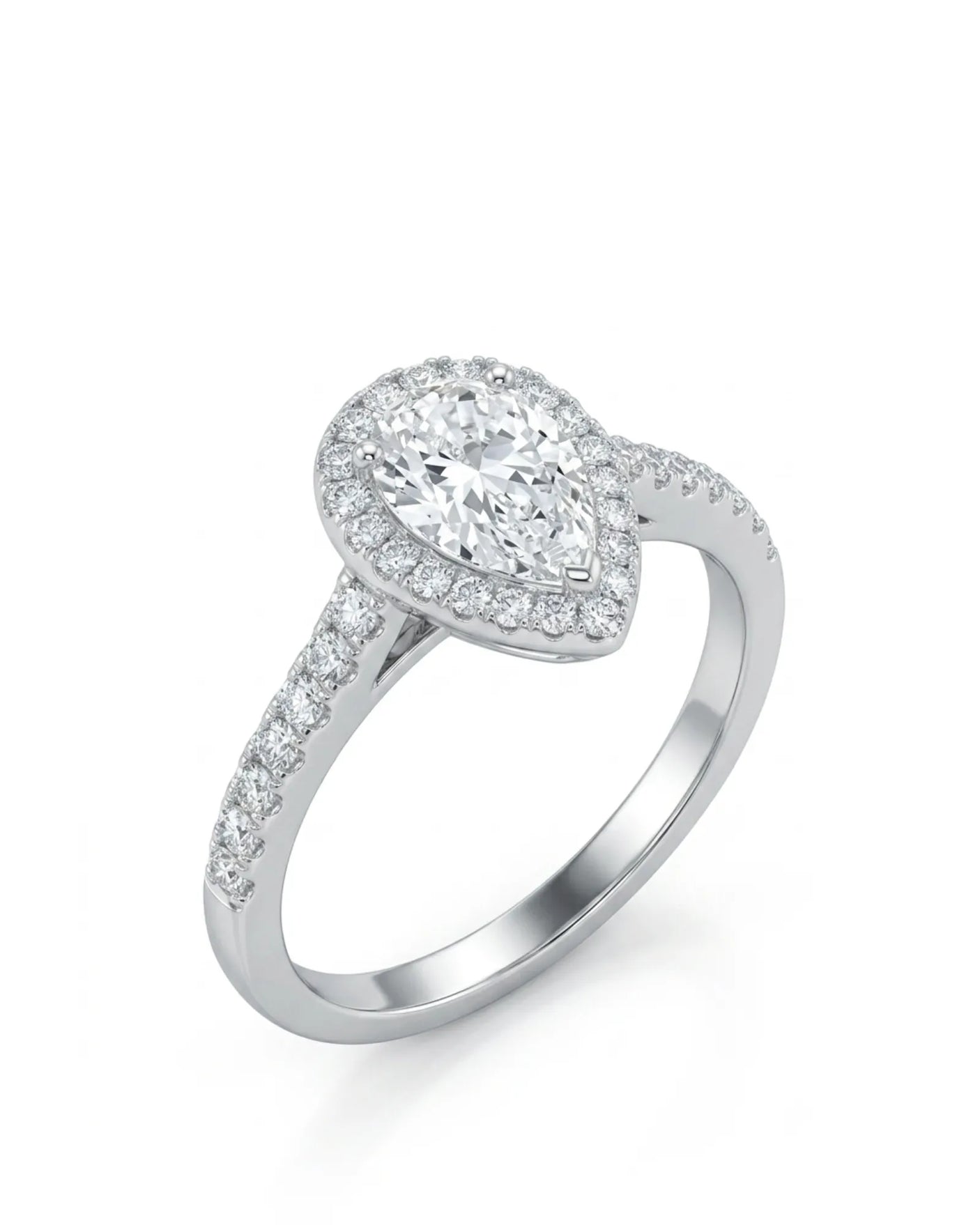 Pear shaped moissanite engagement ring with round halo and pavé shoulders crafted in platinum | SARATTI
