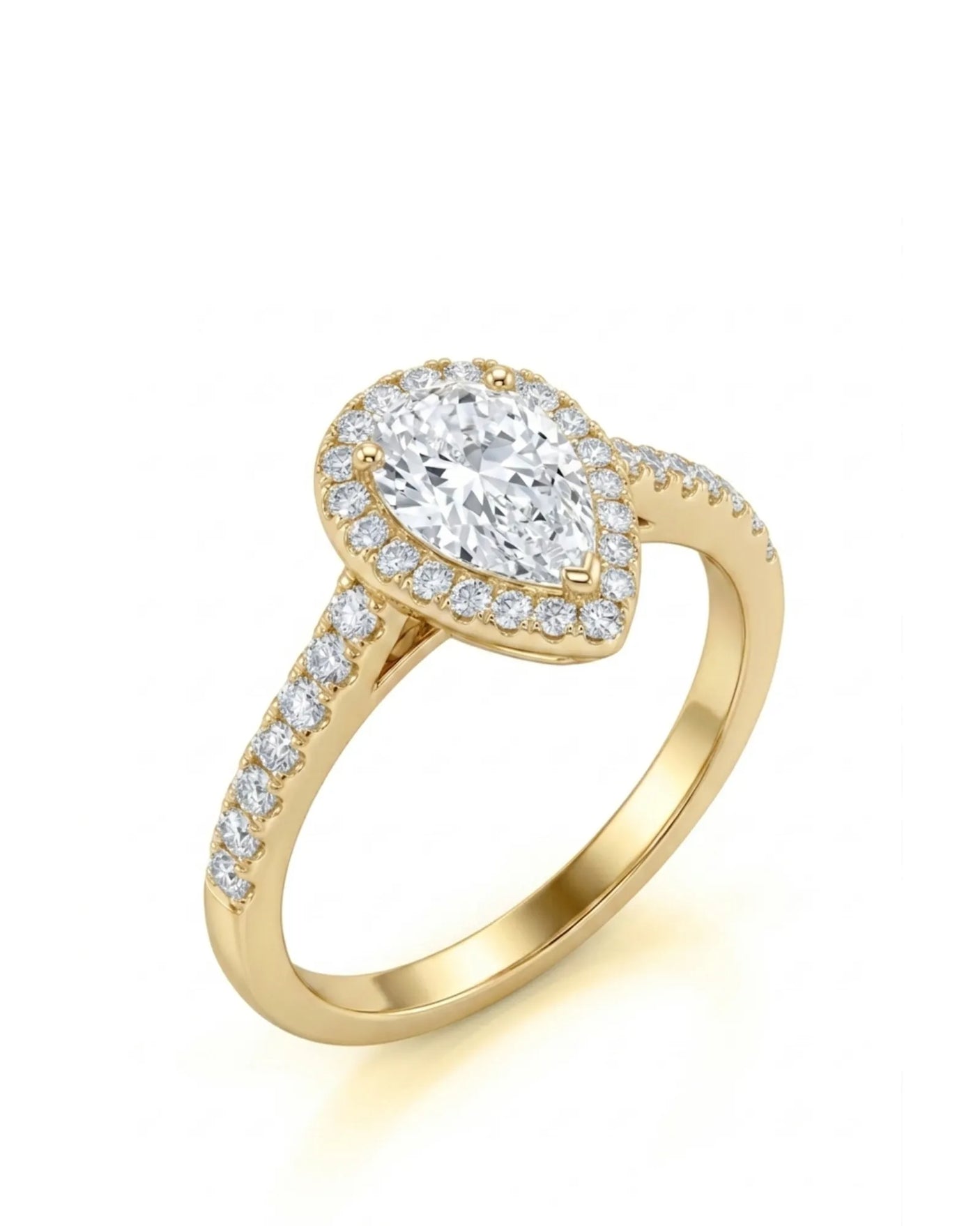 Pear shaped moissanite engagement ring with round halo and pavé shoulders in 18K yellow gold | SARATTI