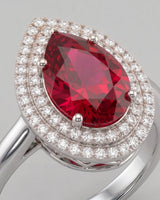 Pear tourmaline engagement ring with double diamond halo in premium platinum | SARATTI