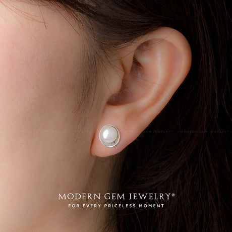 Model wears akoya pearl stud earrings 