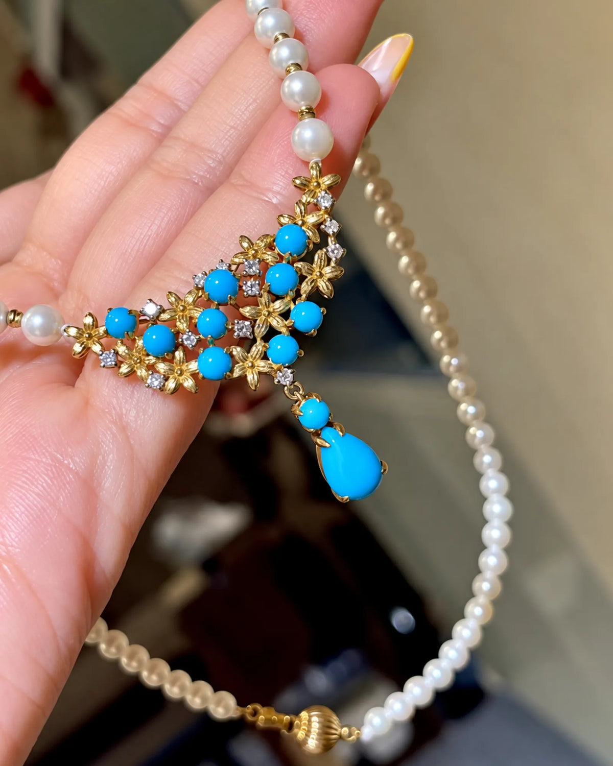 Pearl and blue gemstone floral necklace in 18K yellow gold for elegant occasion styling | SARATTI