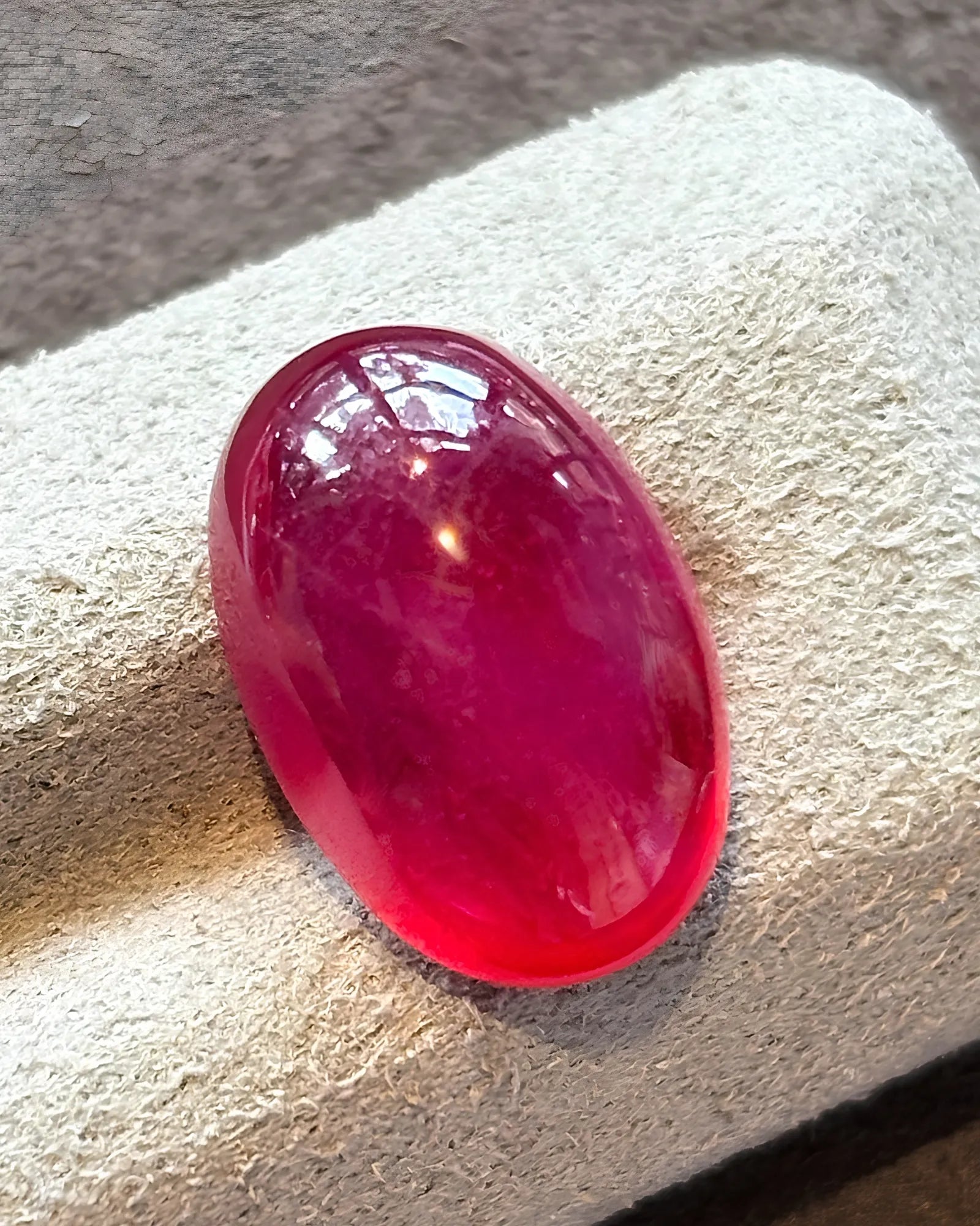 Pigeon Blood Red Natural Ruby oval cabochon three-quarter view | SARATTI