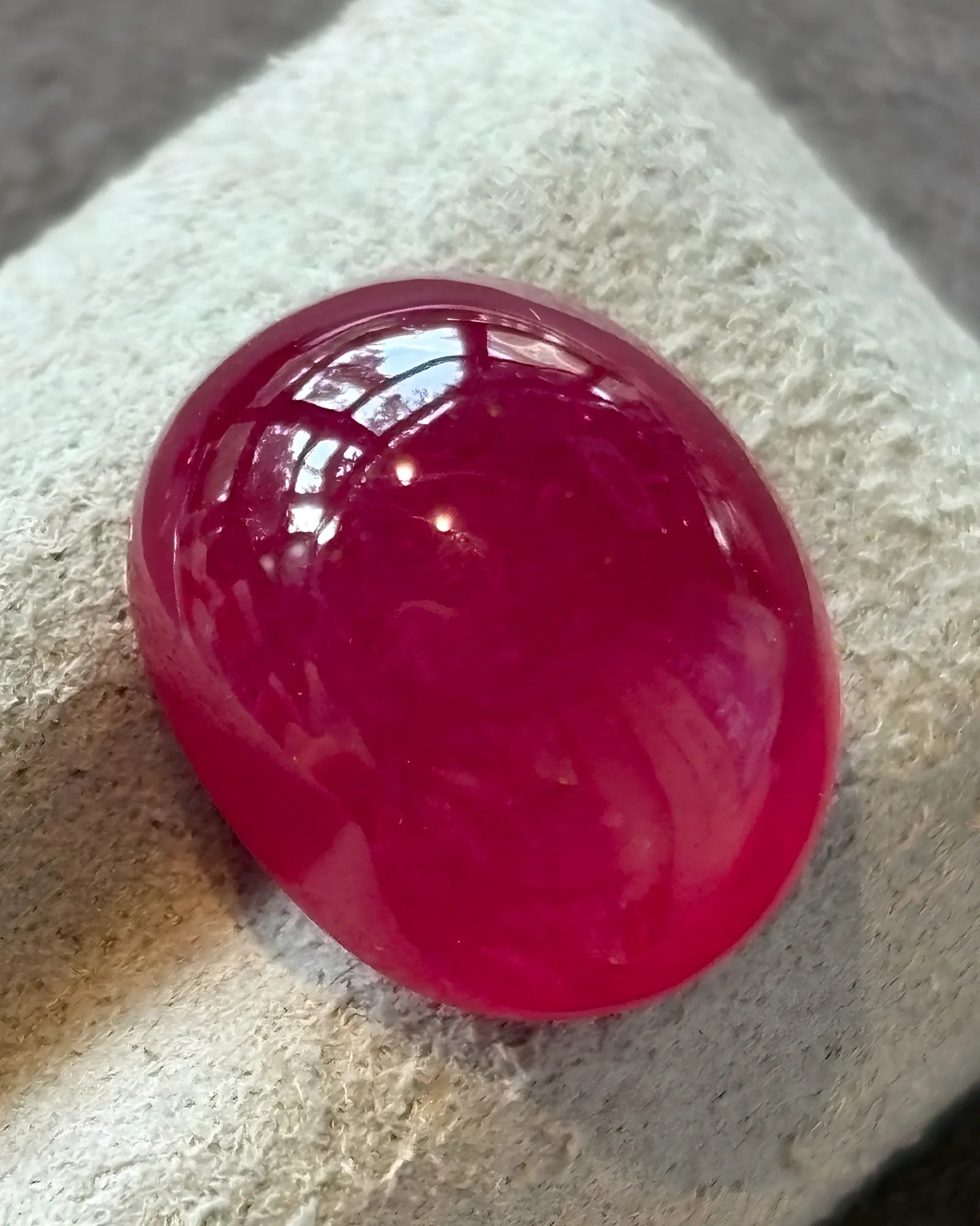 Pigeon Blood Red Ruby oval cabochon alternate angle | SARATTI