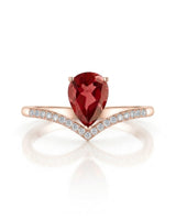Pink pear tourmaline ring with curved diamond V shank in 18K rose gold | SARATTI