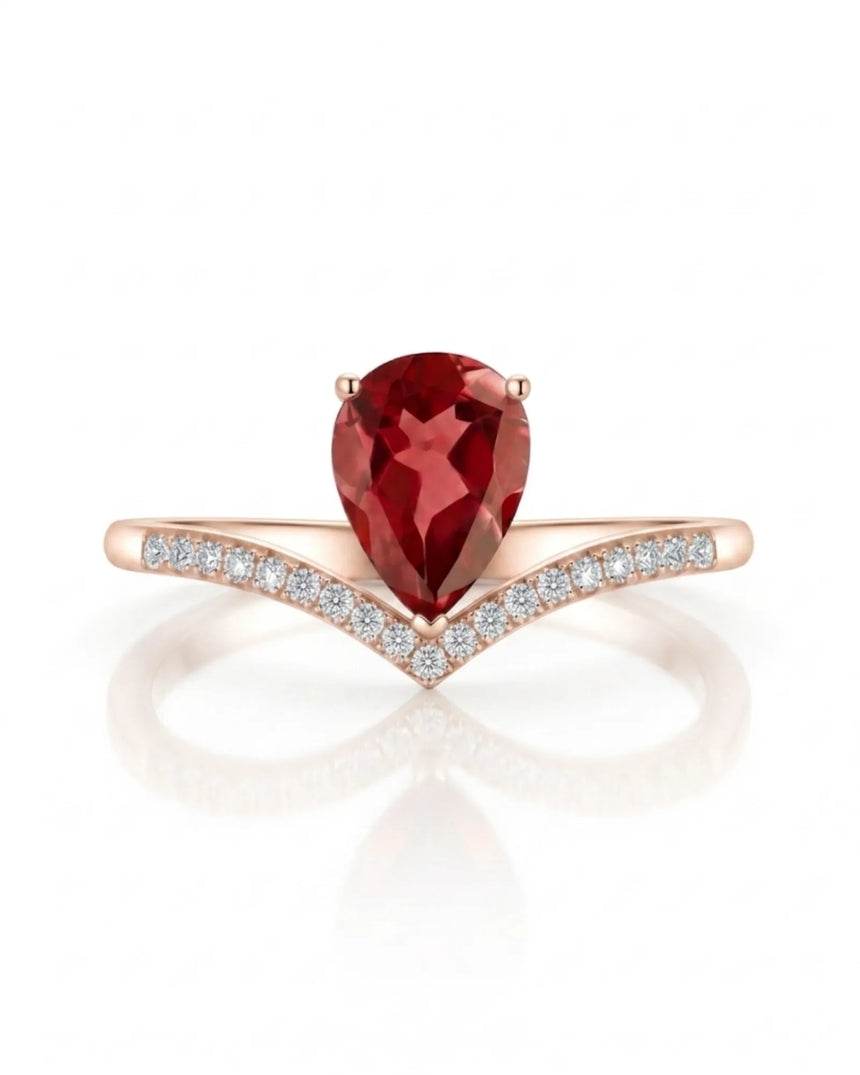 Pink pear tourmaline ring with curved diamond V shank in 18K rose gold | SARATTI