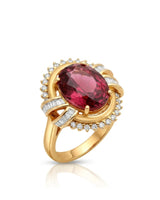 Pink tourmaline ring with oval center stone and T-shaped diamonds in 18K yellow gold | SARATTI