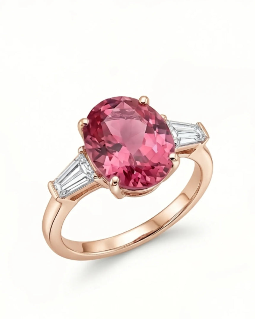 Pink tourmaline ring with oval center stone and emerald-cut diamonds in 18K rose gold | SARATTI