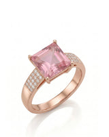 Pink tourmaline ring with princess-cut center stone and three-row diamonds in 18K rose gold | SARATTI