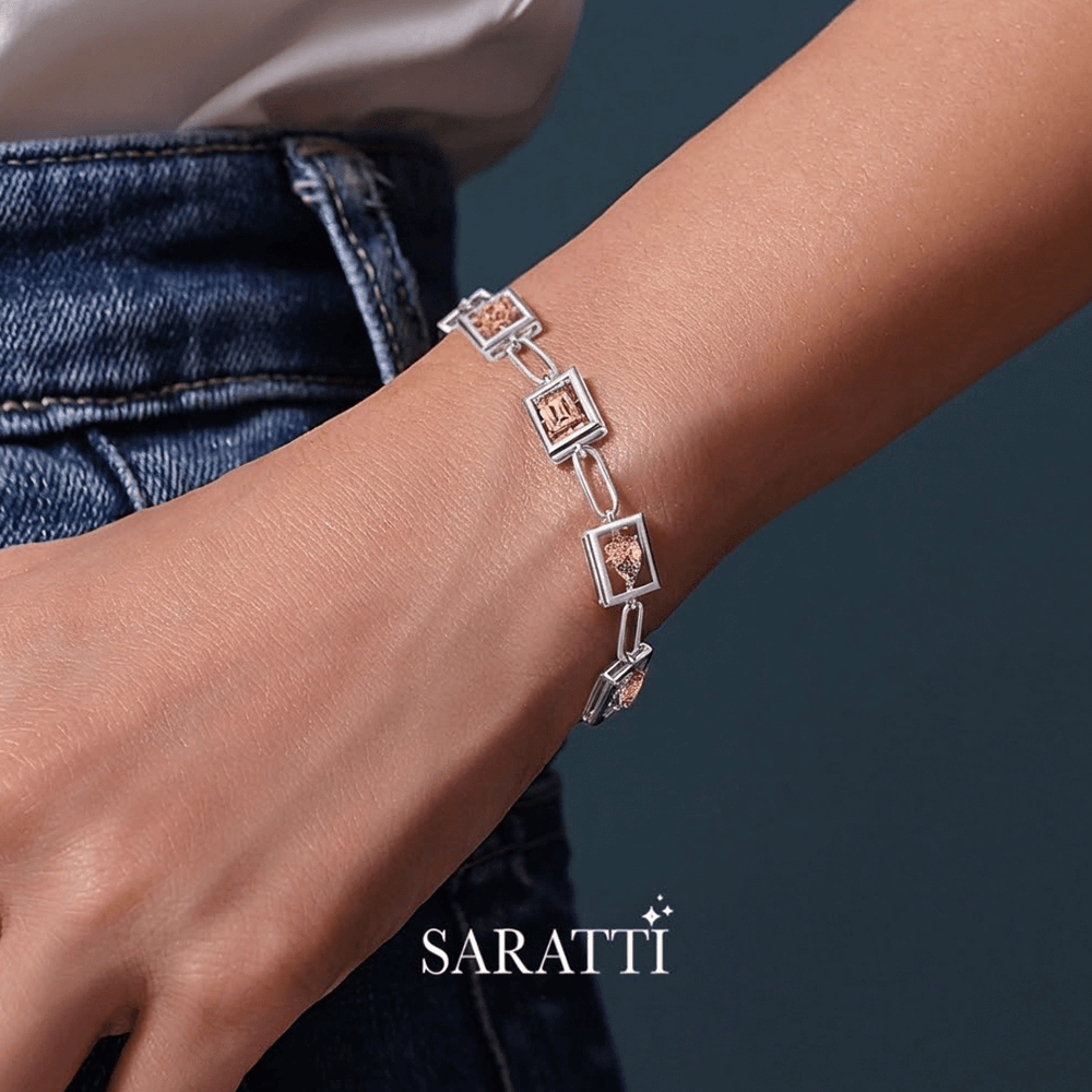 Platinum with square links worn on a wrist, brand 'SARATTI' visible - Platinum Morganite Bracelet Detail Shot – SARATTI