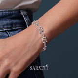Platinum with square links worn on a wrist, brand 'SARATTI' visible - Platinum Morganite Bracelet Detail Shot – SARATTI