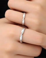 Platinum couple wedding rings featuring a continuous Mobius loop symbolising eternal connection | SARATTI