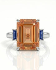 Platinum emerald cut Topaz setting with step-cut blue sapphires - SARATTI