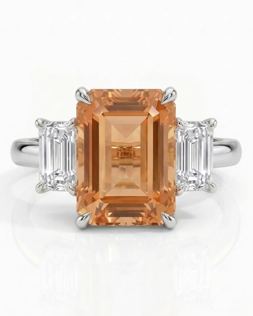 Platinum emerald cut Topaz setting with step-cut diamond accents | SARATTI