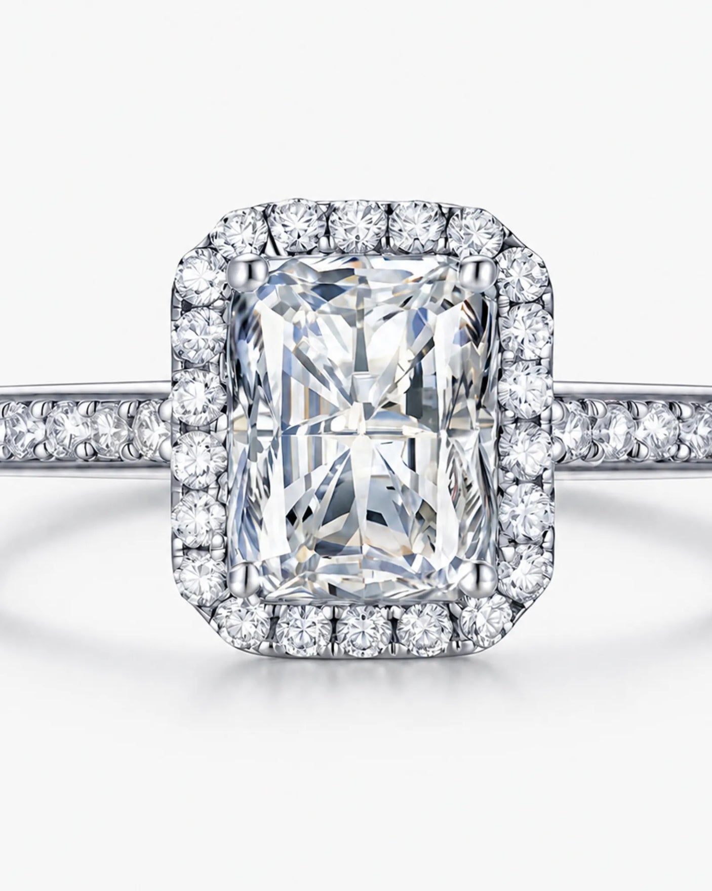 Platinum halo moissanite engagement ring designed for a confident modern proposal | SARATTI