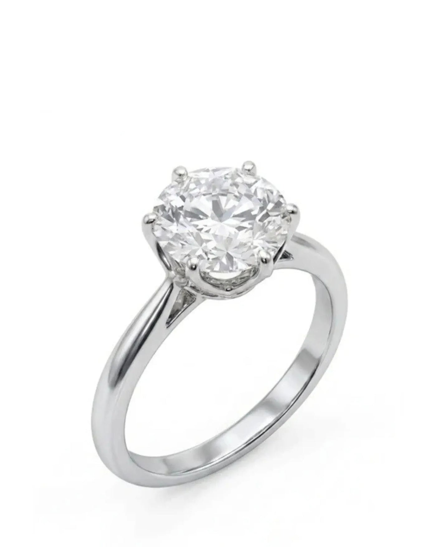 Platinum moissanite engagement ring with round center stone and six-prong solitaire setting | SARATTI