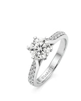 Platinum round moissanite engagement ring with six-prong crown and pavé shoulders | SARATTI
