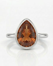 Platinum setting-only design for a selected pear cut Imperial Topaz | SARATTI