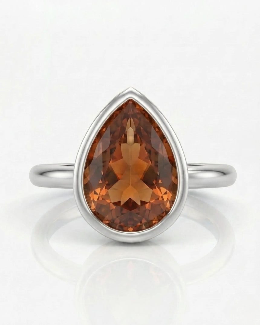 Platinum setting-only design for a selected pear cut Imperial Topaz | SARATTI