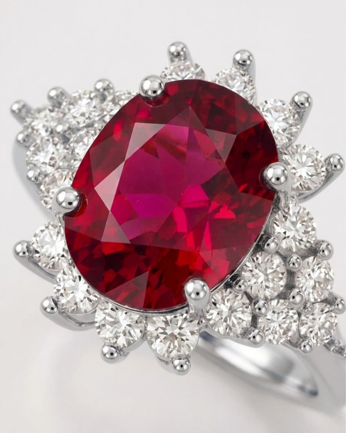 Platinum tourmaline ring with floral diamond halo and vivid reddish pink gemstone center | SARATTI