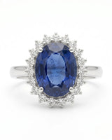 Princess Diana-inspired sapphire ring with classic diamond halo in polished platinum | SARATTI