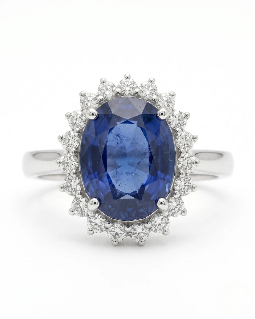 Princess Diana-inspired sapphire ring with classic diamond halo in polished platinum | SARATTI